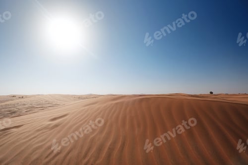 Preview: Sunset over the sand dunes in the desert.