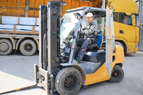 Preview: Man worker at forklift driver happy working in industry factory logistic ship