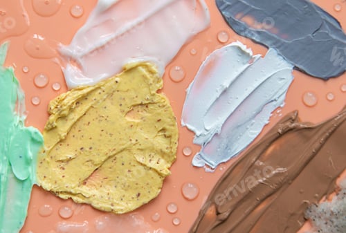Preview: Different smears of cosmetics. Selective focus. Wet.