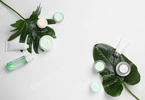 Preview: Flat lay composition with cosmetic products on light background