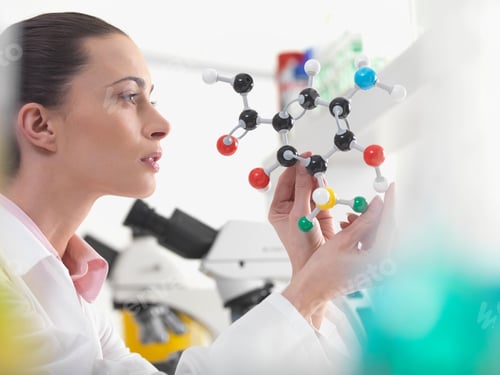 Preview: Scientist examining molecular model