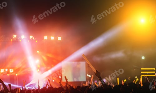 Preview: Crowd of concert stage lights and people fan audience silhouette raising hands or glow stick holding