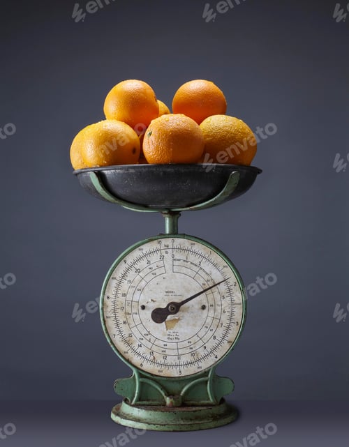 Preview: Fresh oranges on top of vintage kitchen scales