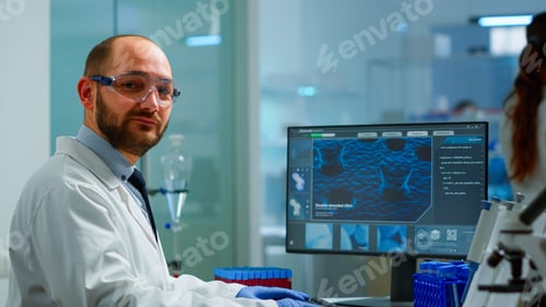 Preview: Portrait of scientist man looking at camera