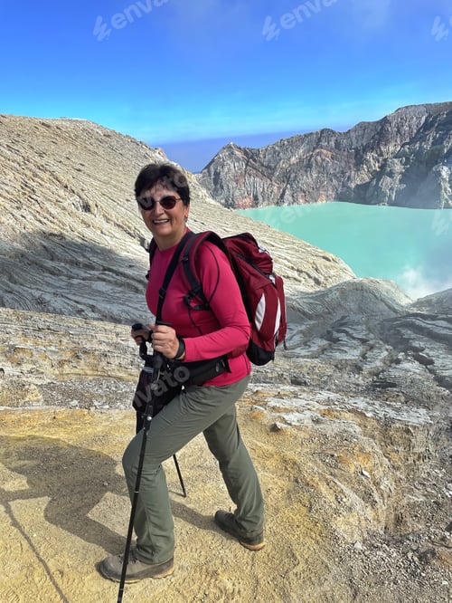 Preview: Portrait of senior woman above Ijen volcano, Indonesia