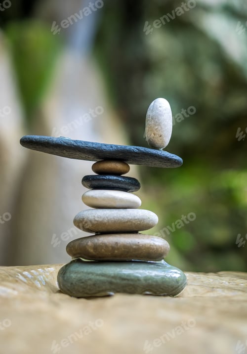 Preview: Rock Zen Stack in front of waterfall.
