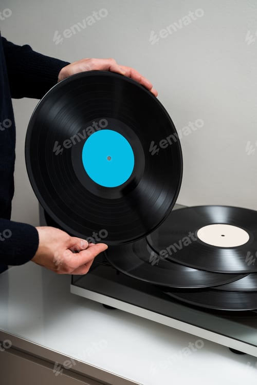 Preview: Rock vinyl in hands of music fan holding classic retro record with hi fi tone