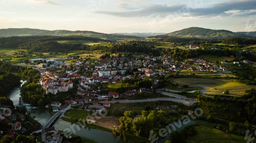 Preview: Zuzemberk Castle and medieval village on the river Krka in Slovenia. Aerial drone view