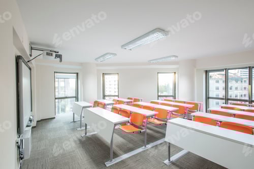 Preview: Classroom with Desks and Chairs in Bright Interior