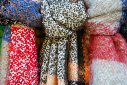 Preview: colored warm scarves in the store