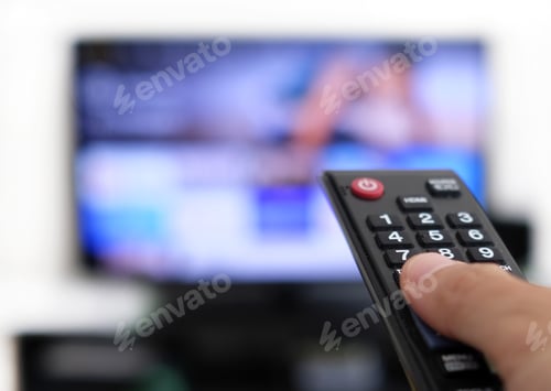 Preview: Remote control and screen - binge watching the favourite TV show