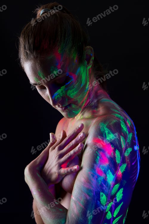 Preview: Topless model in neon lights