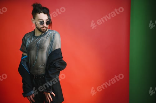 Preview: Portrait of a gay man on a colored background. Gender equality.