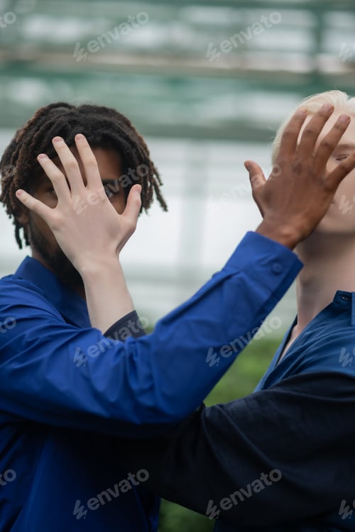 Preview: Men with different nationality hiding their faces