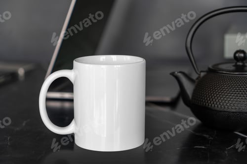 Preview: White Mug and Black Tea Pot on Desk