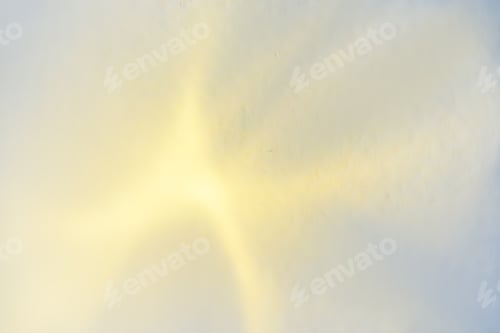 Preview: Abstract blurred rainbow glitter background. Yellow light.