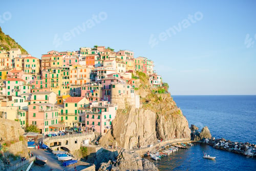 Preview: Stunning view of the beautiful and cozy village of Manarola in sunset. Liguria popular region of