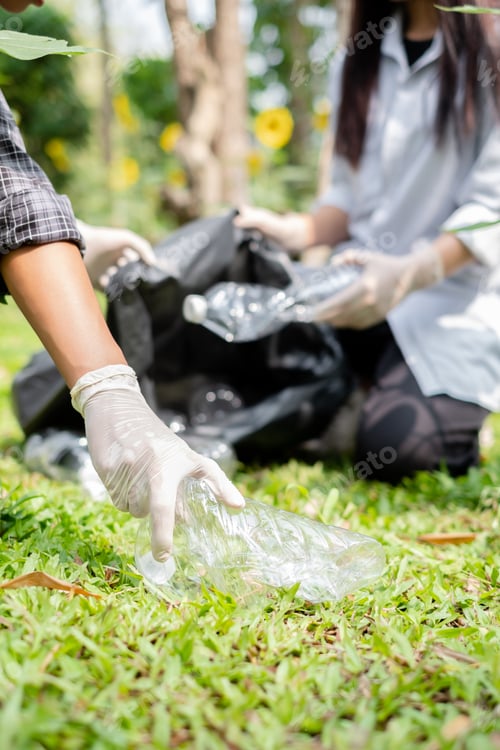 Preview: garbage collection, volunteer team pick up plastic bottles, put garbage in black garbage bags
