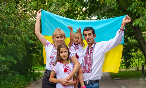 Preview: Family Ukrainians in vyshyvanka patriots. Selective focus.
