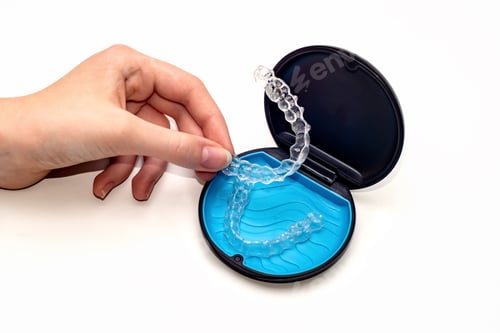 Preview: Teeth aligners in a storage case. Invisible braces. Clear teeth straighteners. Clear plastic braces