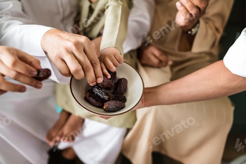 Preview: People sharing some dried dates