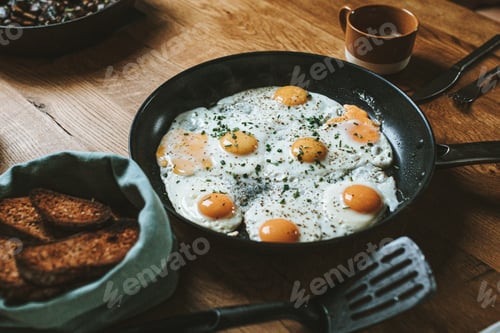 Fried Eggs with Toast for a Morning Breakfast