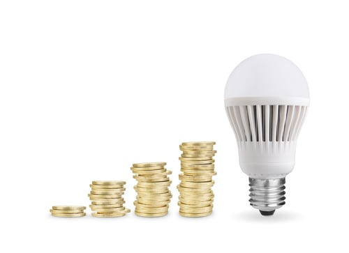 Preview: Money Savings Concept with Coins and Lightbulb