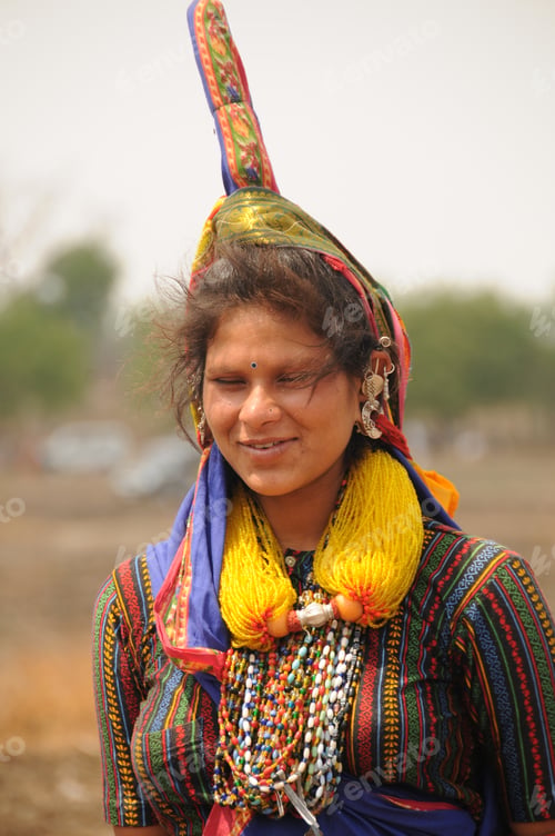 Preview: Young Banjara tribal women with ornaments and colorful dress, India