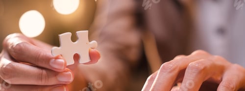 Preview: Concept of integration and startup with puzzle pieces merger with teamwork of business worker