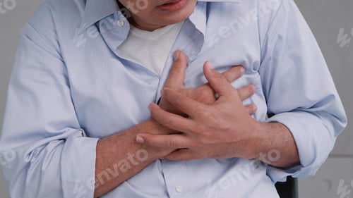 Preview: Asian man has chest pain caused by heart disease.
