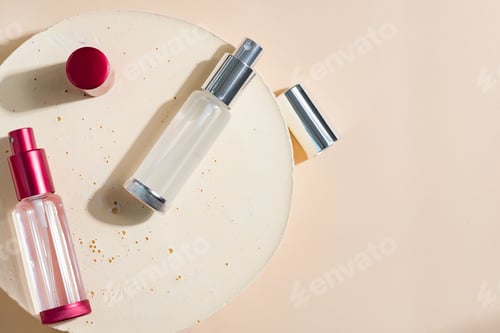 Preview: colorful glass package perfume on beige background