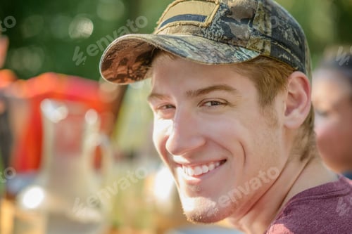 Preview: Man smiling at tomato eating festival
