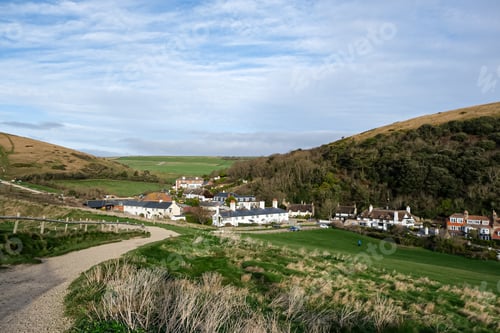 Preview: Lulworth Cove, Dorset, UK - 20.12.2023. Lulworth Cove village view, Dorset, England, UK. Lulworth Co