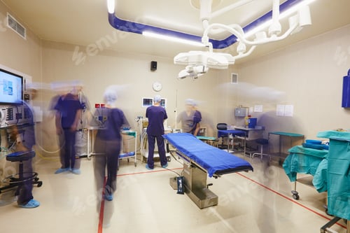 Preview: Shot of a team of surgeons prepping an operating room for a surgery