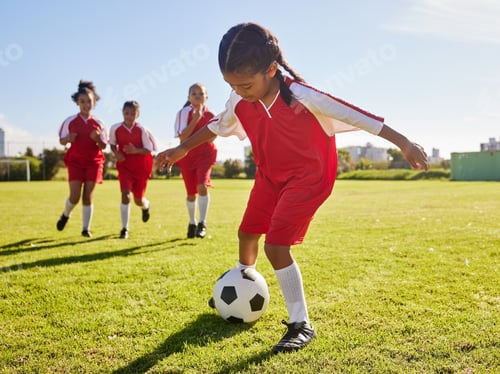 Preview: Soccer, training or sports and a girl team playing with a ball together on a field for practice. Fi