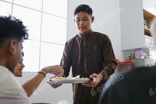 Preview: Muslim Man Served a Tray of Food For His Friends To Break Fasting During Holy Ramadan Month