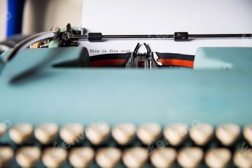 Preview: Fake News written on typewriter