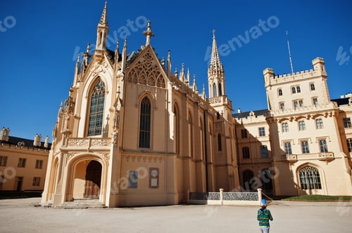 Preview: Boy explore in Lednice castle in Czech republic.