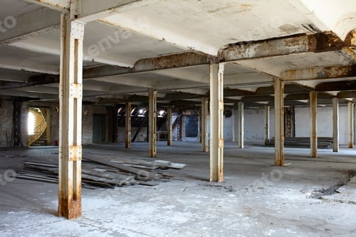 Preview: Abandoned industrial building interior with columns and scattered debris, Berlin, Germany