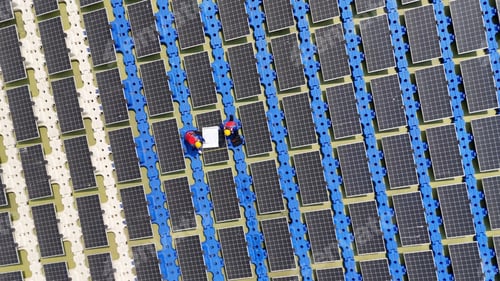 Preview: Floating solar panels providing renewable energy. Aerial view floating on solar cells