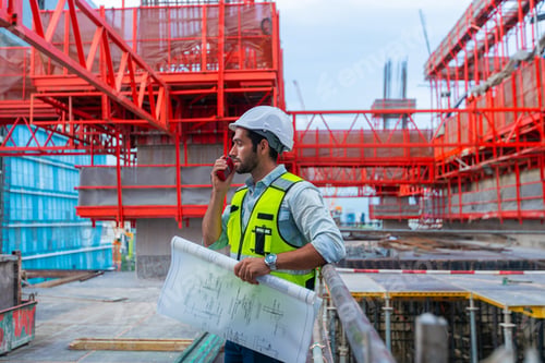 Preview: Portrait of an engineer designing a concrete floor and column structure for a shopping center.