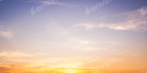 Preview: Orange Sunset Sky Clouds in the evening with Yellow and blue sunlight on Golden hour sun down