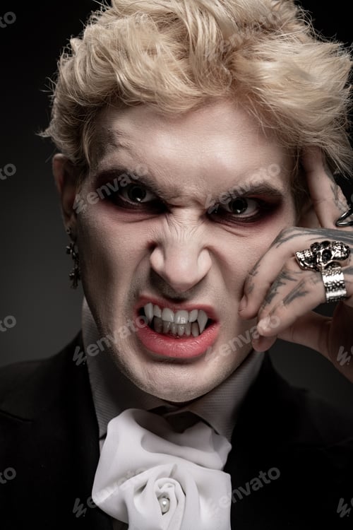 Preview: Young man showcases his epic Halloween costume with fierce expression and stylish flair