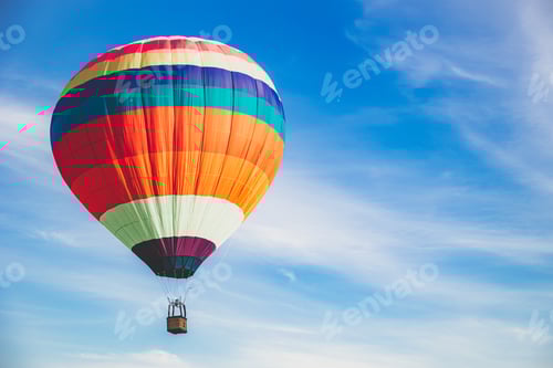Preview: Colorful balloon flying on summer sky with copy space for text