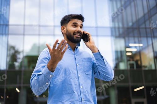 Preview: Man Talking on Phone Outdoors