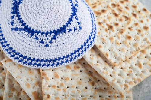 Preview: Passover celebration concept. Matzah, red kosher and walnut. Traditional ritual Jewish bread matzah,