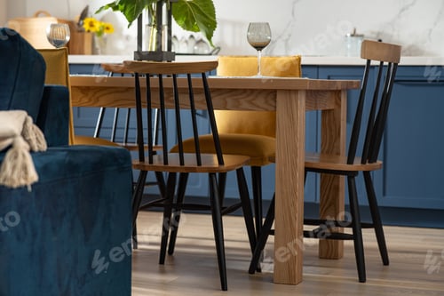 Preview: Modern Scandinavian kitchen with wooden table and chairs