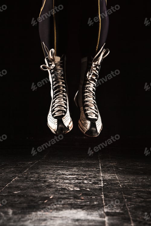 Preview: The legs of muscular man with skipping rope