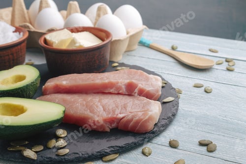 Preview: Concept of ketogenic diet. Dietary food on light table
