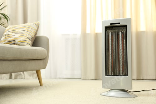 Preview: Modern electric infrared heater on floor at home. Space for text